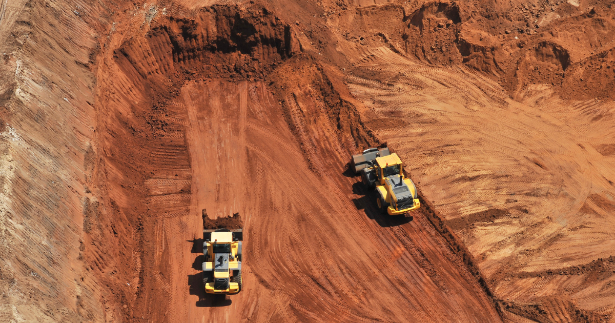 Bulldozers grading a construction site