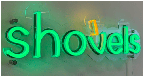 Shovels neon sign in Concord office